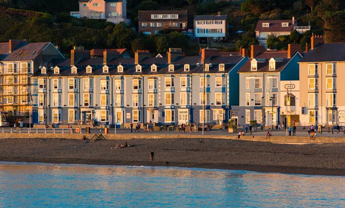 Hotel seafront exterior at sunset